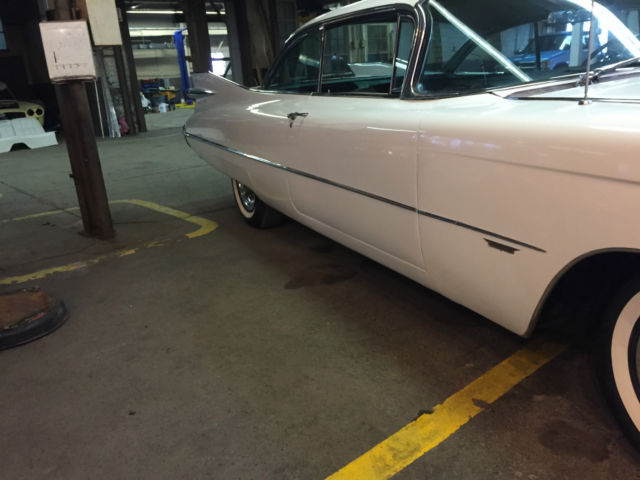 1959 cadillac coupe 62 series. eye catching rare green interior> rare combo