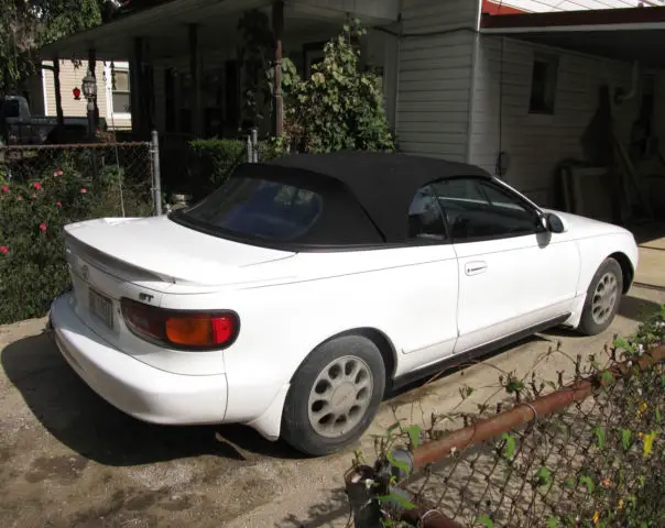 white convertible, recent paint and body work, new stereo and speakers