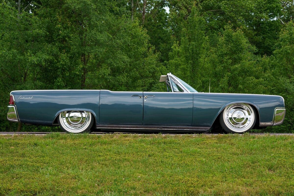 one of 3,138 four-door lincoln continental convertibles made in 1963