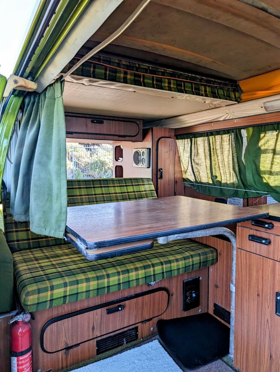 vw westfalia campervan with pop-top tent