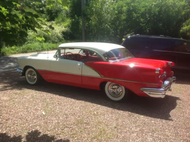 striking red and white 56 olds 88 2 door hardtop
