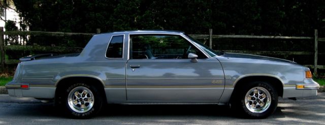 1987 stunning silver,v-8 5.0l,auto,low 55k orig window sticker,cold ac,ps,pdb,pw