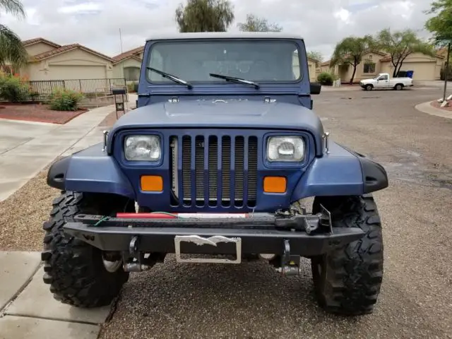 jeep 4x4 wranger 1990 five speed blue two door hard top flat 6 cyl 4.2 cy rock