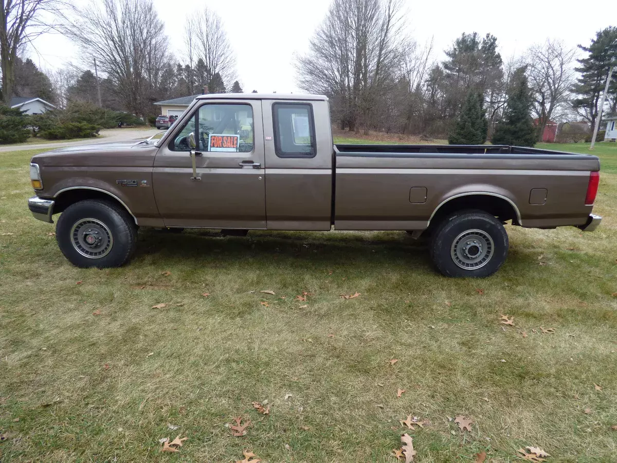 1992 ford f250 5.9 cummins turbo diesel 5 speed man.extended cab 4x4 8 foot box