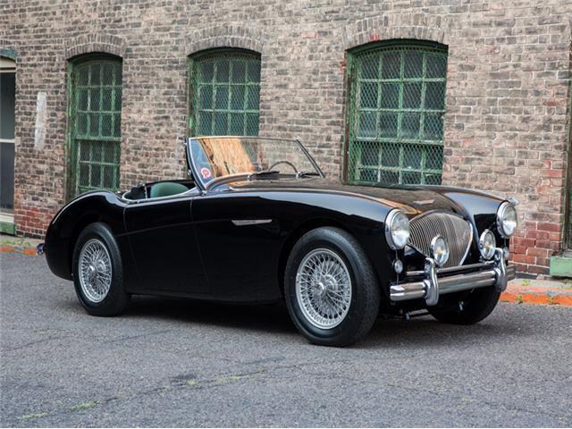 a classic british sports car, fresh bmc restoration, finished in striking colors
