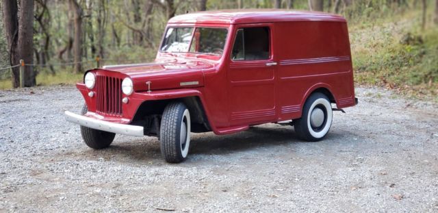 1949 red metallic willys jeep over land wagon
