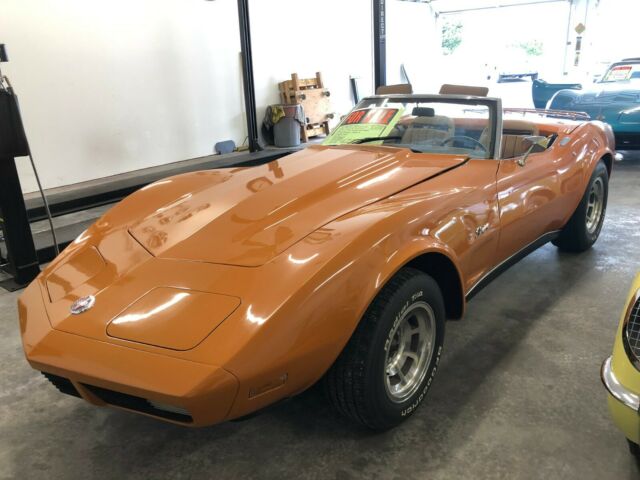 1973 chevrolet corvette convertible ontario orange/tan top. 67,800 miles