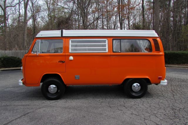 reconditioned brilliant orange camper