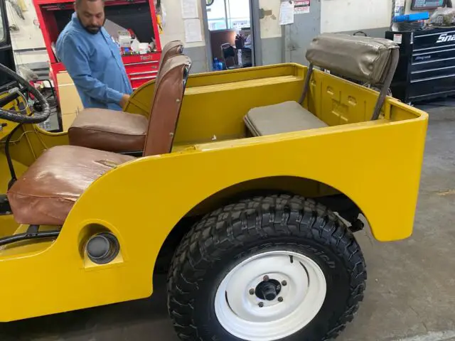 military style wheels, upgrated suspension, engine swap, manual transmission