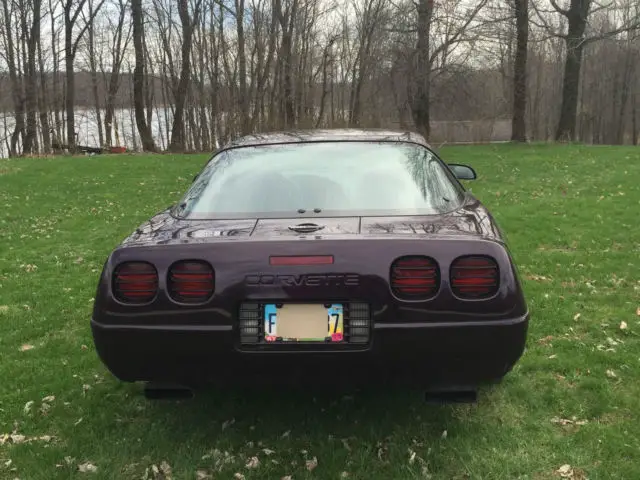 2 door coupe 5.7l black rose 55,500 original miles hard top and glass top