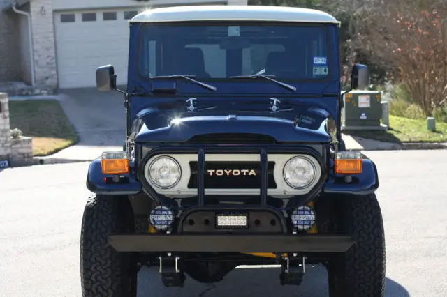 fj40 with 1,800 miles, total refurb, mint condition, custom patriot blue pearl