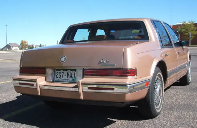 cadillac seville 1990 - copper colored - (cheyenne)