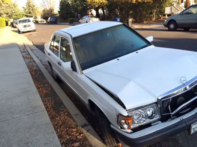 white clean, working and used for commute/ car just needs a hood and radiator