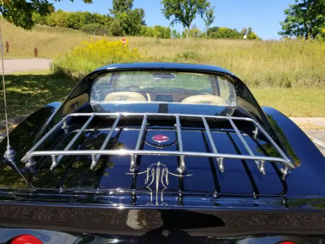28,000 miles. great color combo, back with tan leather interior! ac, glass t-top