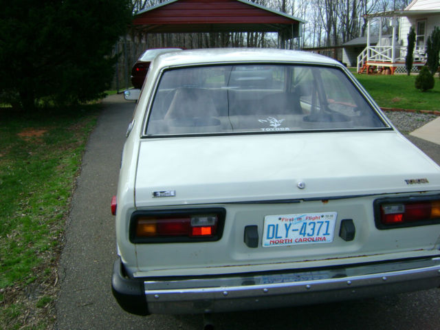 toyota corolla,rx7,datsun