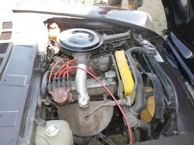 1977 brown fiat 124 spyder
