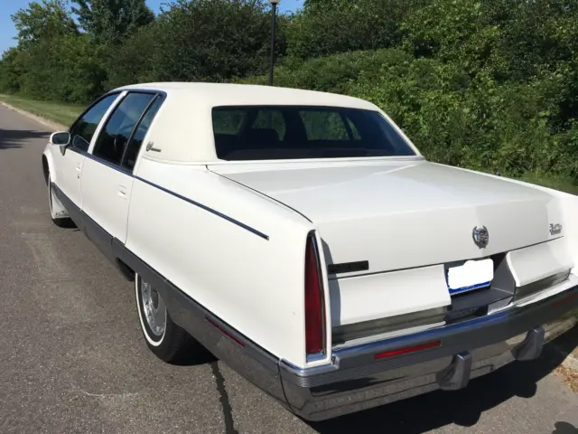 gorgeous white '93 fleetwood with dark cherry brougham leather seating