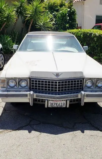 1974 white cadillac sedan deville