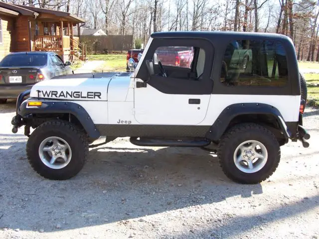 1994 jeep wrangler ( 4.0 ) 6cyl. five speed manual transmission 4" lift kit