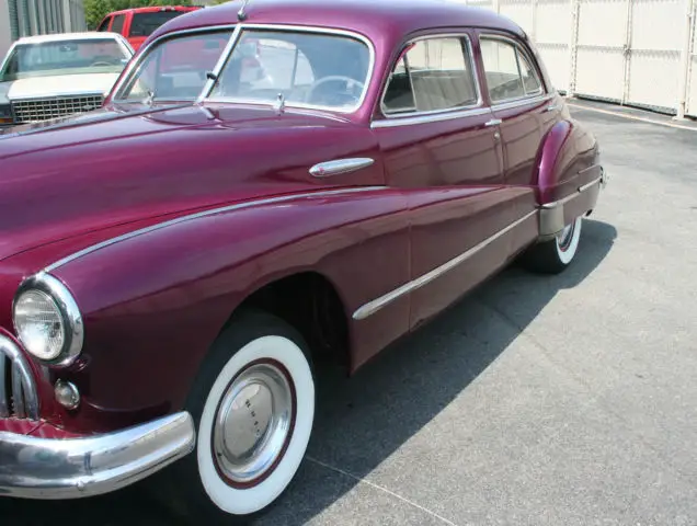 beautiful burgundy 1946 buick super model 51 four door sdn. nice rolling project