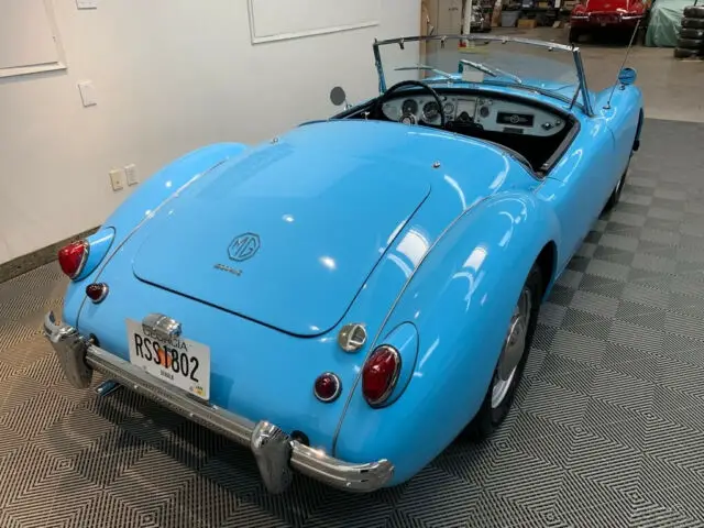 1956 mga 1500 roadster. 1800 mgb driveline. nicely restored car