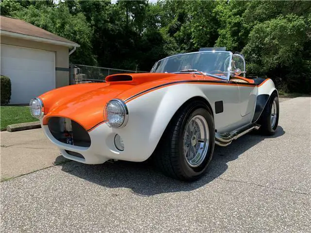 1967 shelby cobra replica roadster 11499 miles orange, black, and white 2dr road