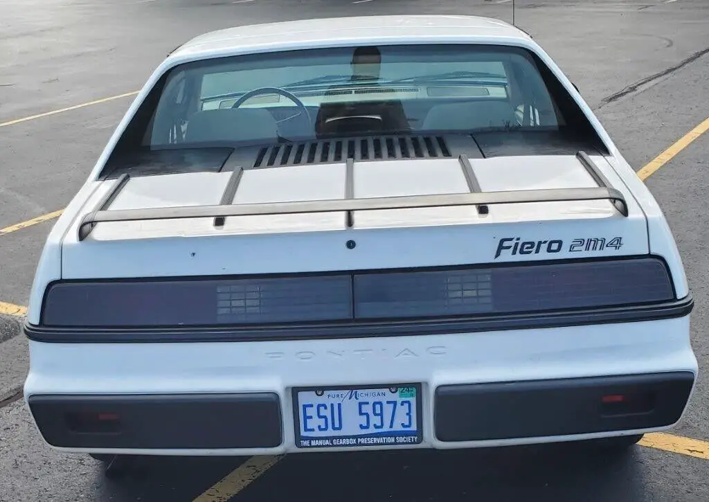 1984 pontiac fiero manual 4-speed iron duke white and tan base