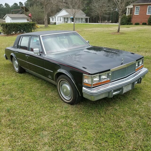 1977 cadillac seville black w/ red leather 66,000 miles