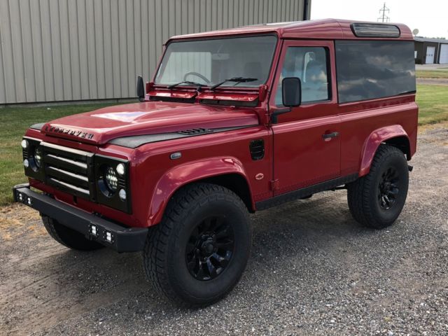 exceptional land rover defender 90! low miles! firenze red