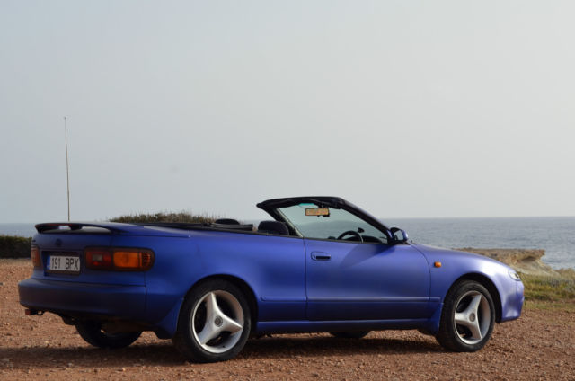 automatic, new exhaust,new convertible top,low mileage,4-wheel steer, rare, jdm