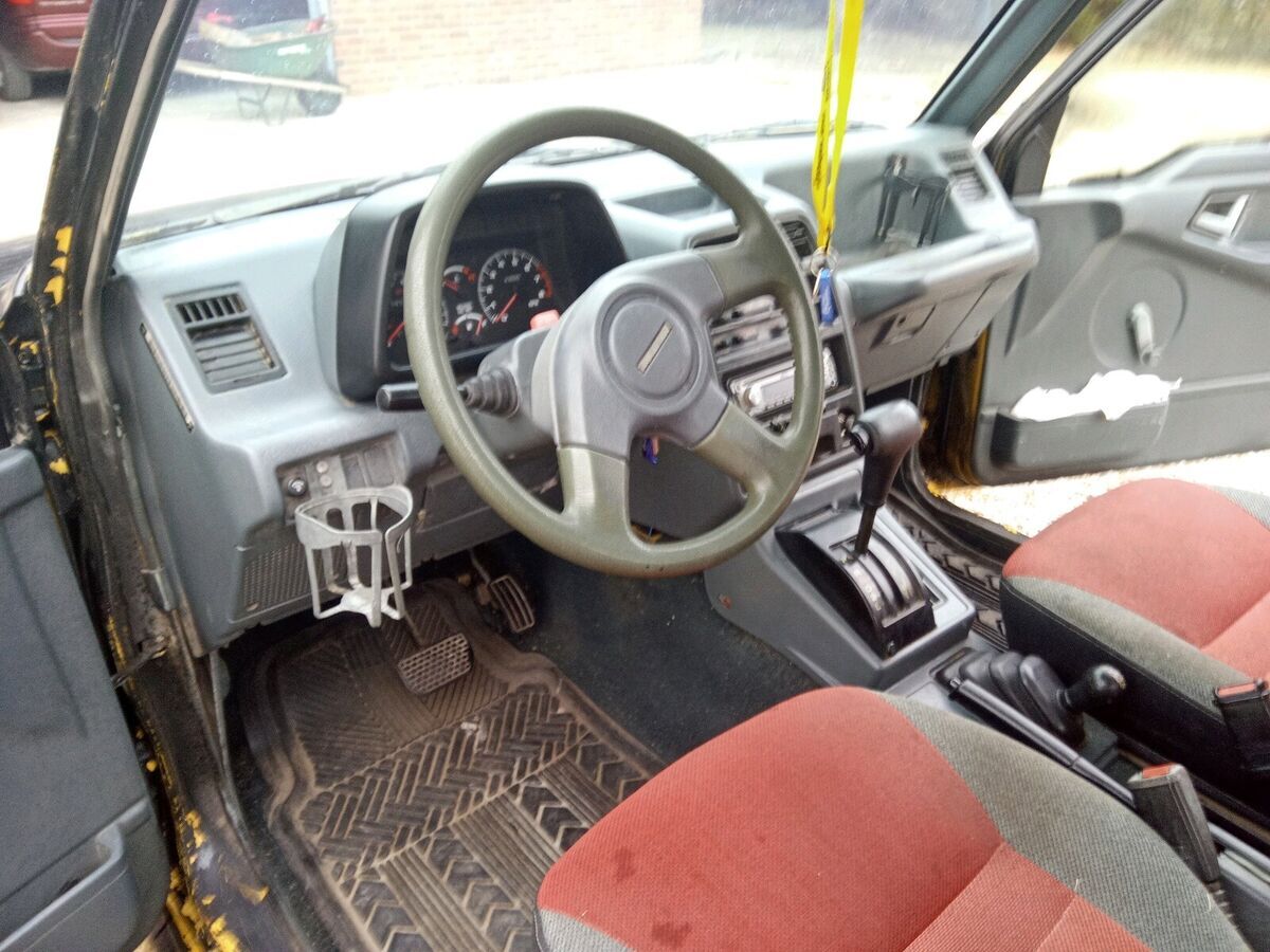 1991 geo tracker black 4wd automatic