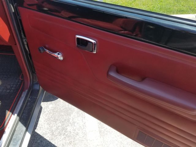 1986 black ford ranger with original wheels and upholstry