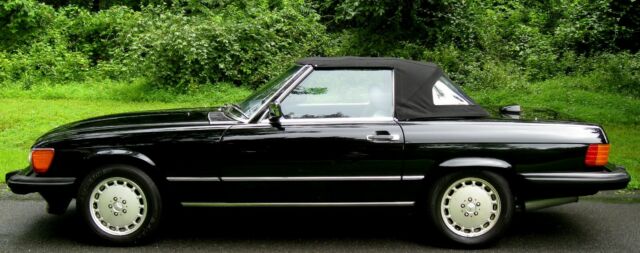 1986 560sl roadster,stunning black/gray leather,2 tops,85k,v-8,auto,garaged,exc