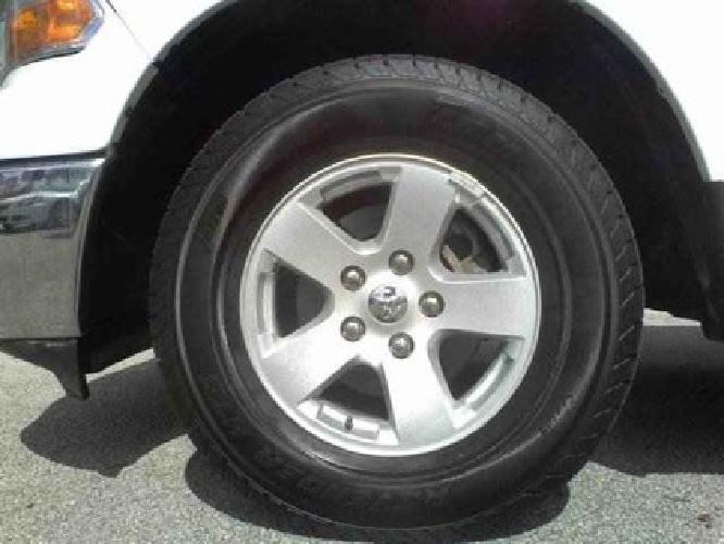 2011 ram 1500 quad cab slt pickup 4d 6 1/3 ft in jacksonville, fl