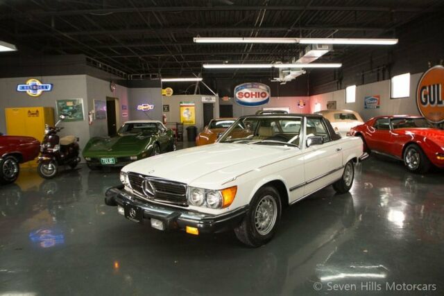 low miles, excellent condition, white/tan, service records, priced to sell!!