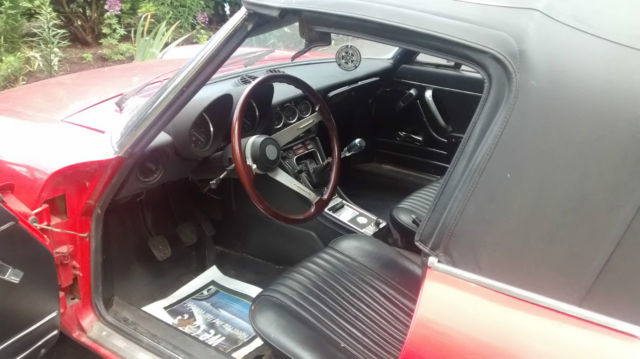 red 1976 alfa romeo