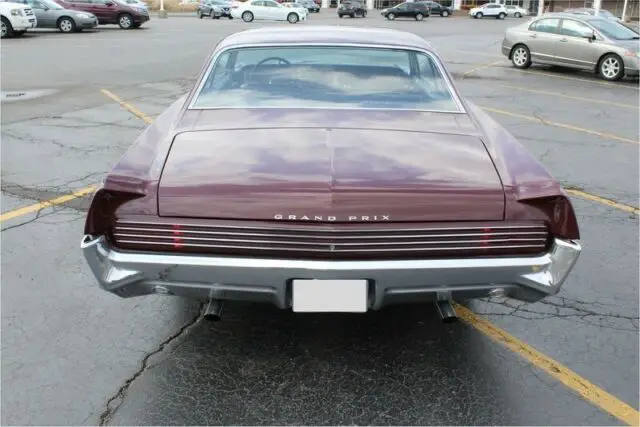 pontiac grand prix burgundy/maroon with 45,000 miles, for sale!