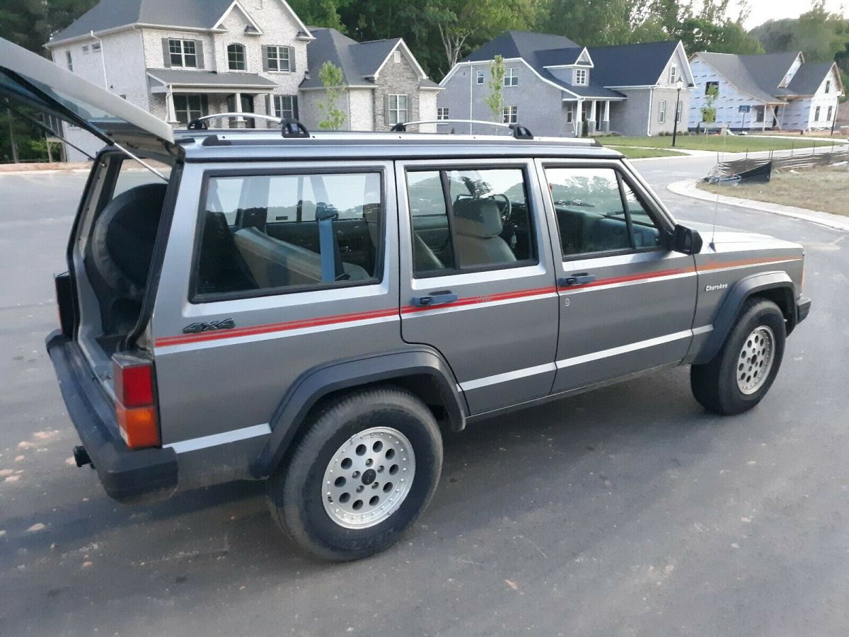 1991 jeep cherokee sport 4.0l 4x4 automatic w/ac 148k miles completely stock