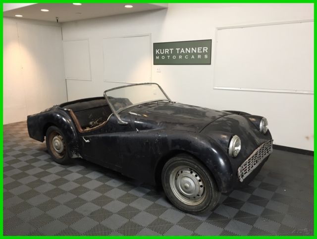 1958 triumph tr3a sports roadster. red on red. very good car for restoration