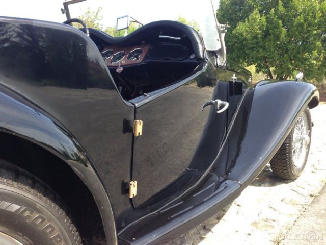 1954 mg tf 1250 roadster. wire wheels. 4 speed. matching number engine. blk/blk
