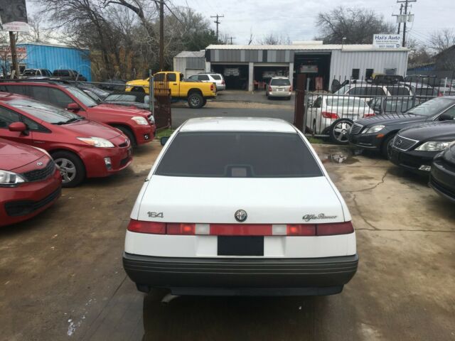 white 1991 alfa romeo 164l sedan 3.0l v6 4-speed automatic