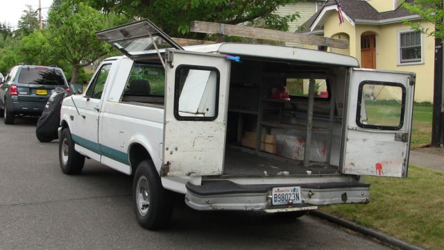 1994 ford f-150 pickup truck. 4.9l straight 6. side access steel canopy