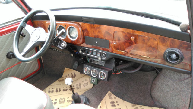 left hand drive 1986 mini chelsea price includes shipping to usa. super mini