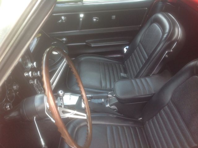 67 corvette convertible red with black top and interior. matching number 427