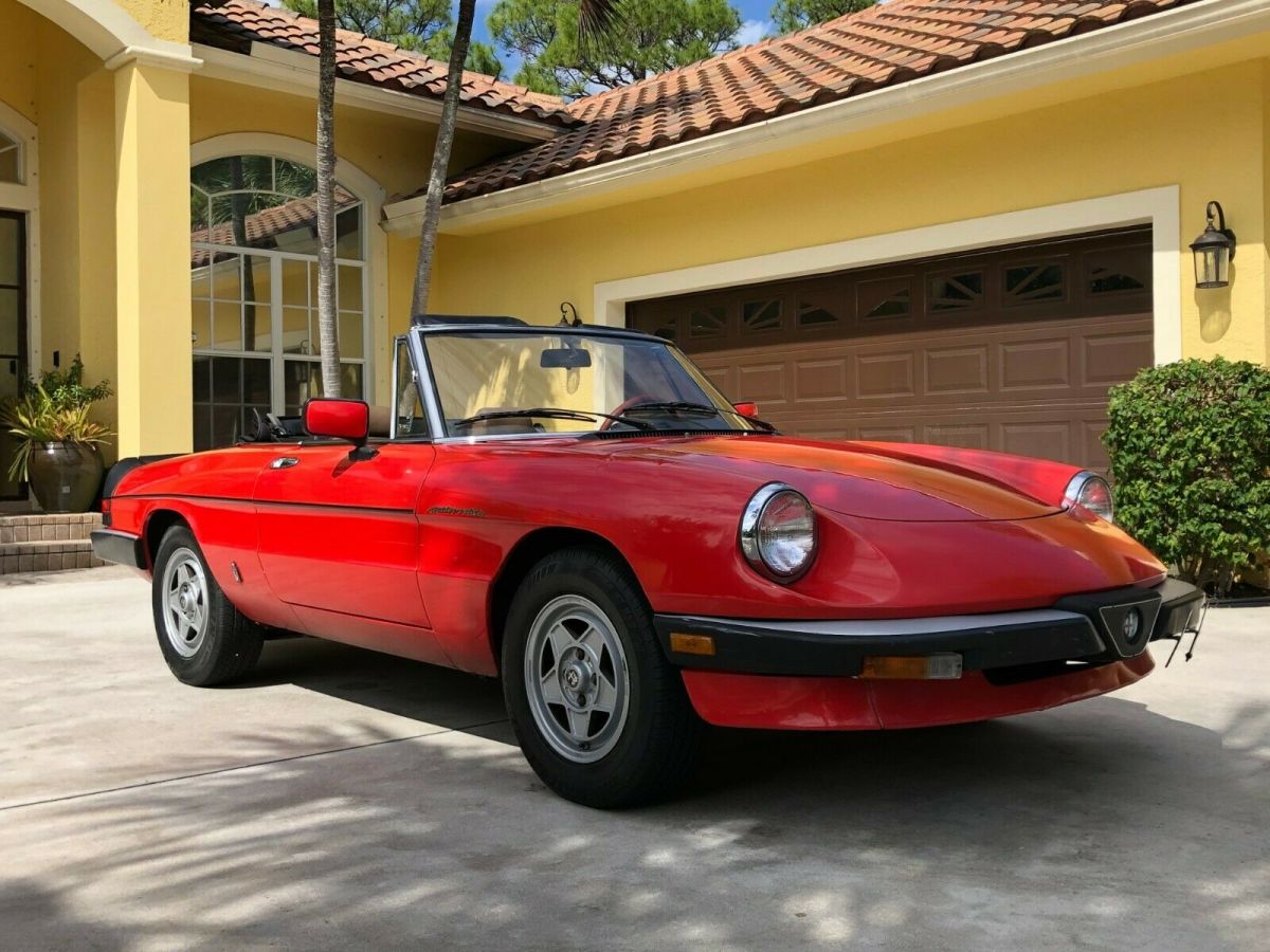 alfa romeo spider veloce,1983,red,tan leather 43,508 miles.5 speed