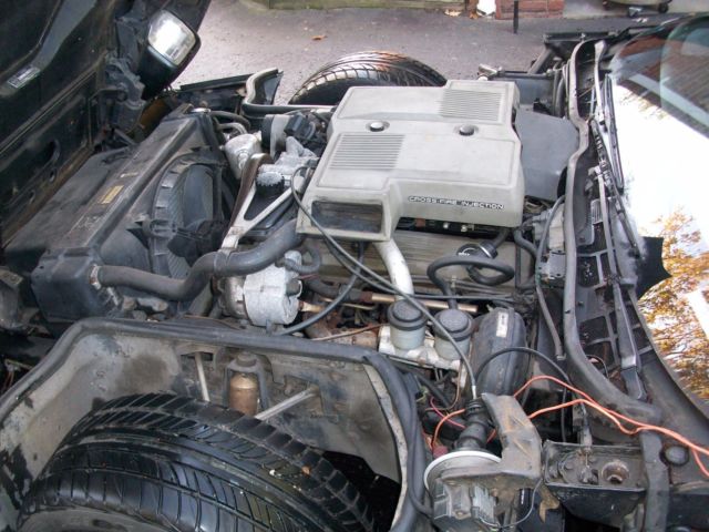 1984 chevy corvette black, removable roof, runs great needs work