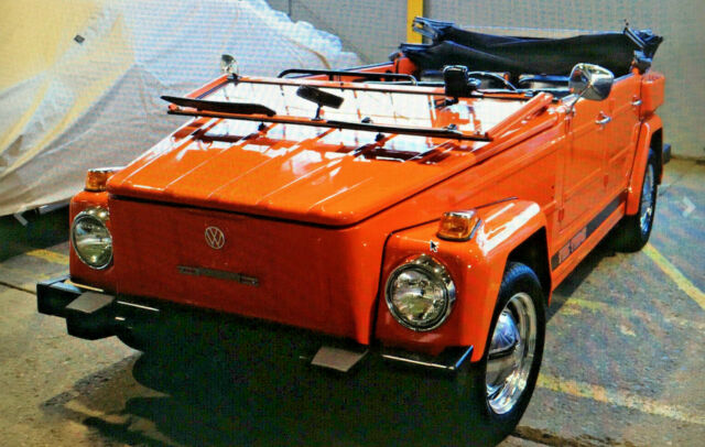 beautiful orange vw thing in striking orange with black interior. soft top