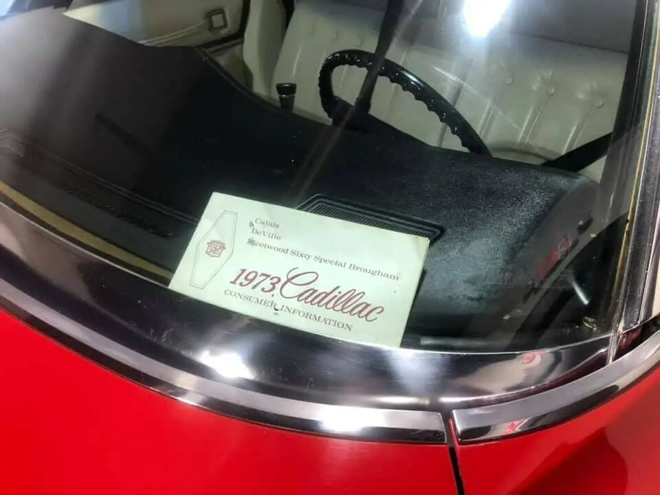 red 1973 cadillac sedan deville