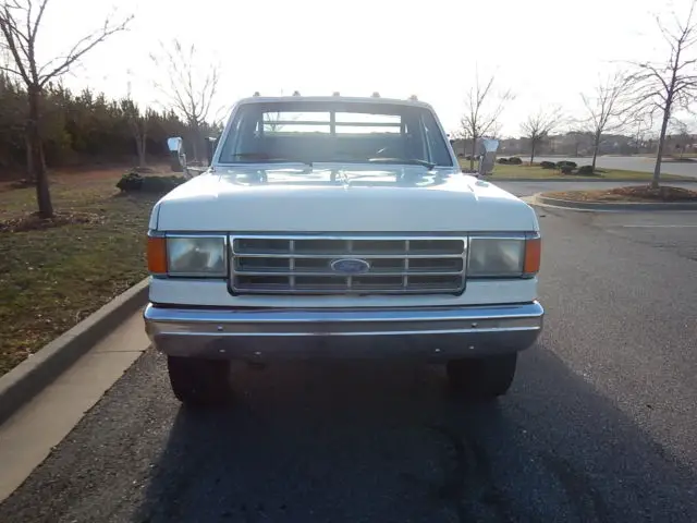 reliable 7.3 diesel with low miles flat bed stake body dump truck *359 450 3599