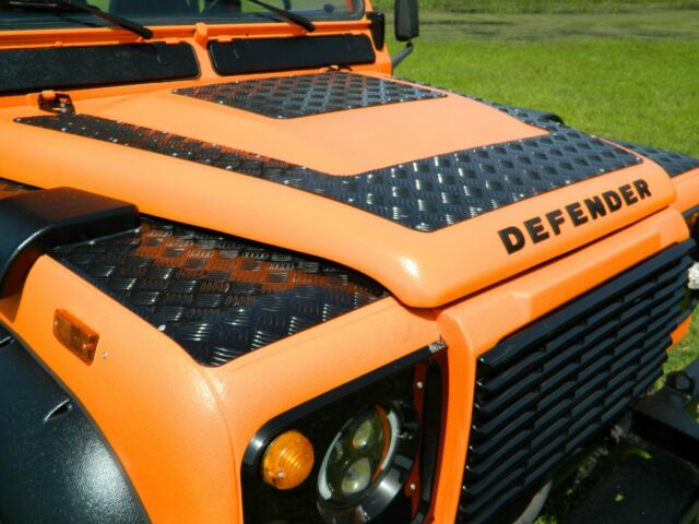1990 dominator orange land rover defender 110 pickup